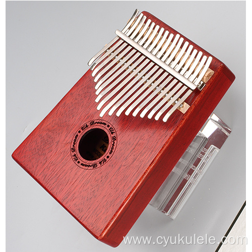 Textured red thumb piano